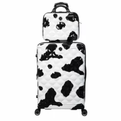 IT Luggage Indulging - 4pc Set (Moo Cow Print) 32 IT Luggage Indulging - 4pc Set (Moo Cow Print) -Suitcase Shop 33198 UK16 3039A08 16 3039A15Moocowblack whiterepeatprintSSFrontpanel25in